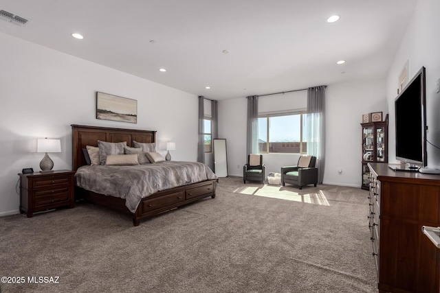 bedroom featuring recessed lighting, visible vents, and light colored carpet