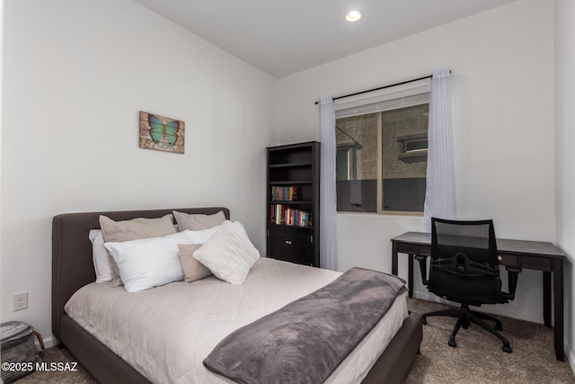 carpeted bedroom featuring recessed lighting