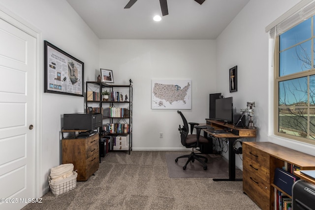 carpeted office space with ceiling fan, baseboards, and recessed lighting