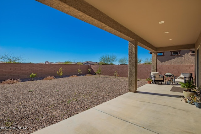 view of patio / terrace with a fenced backyard