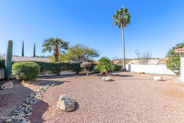 view of front of property featuring a fenced backyard