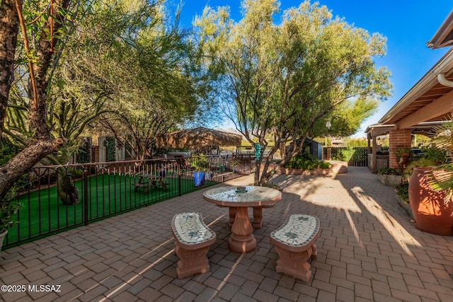 view of patio / terrace with fence