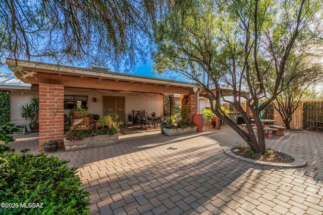 view of patio / terrace with fence