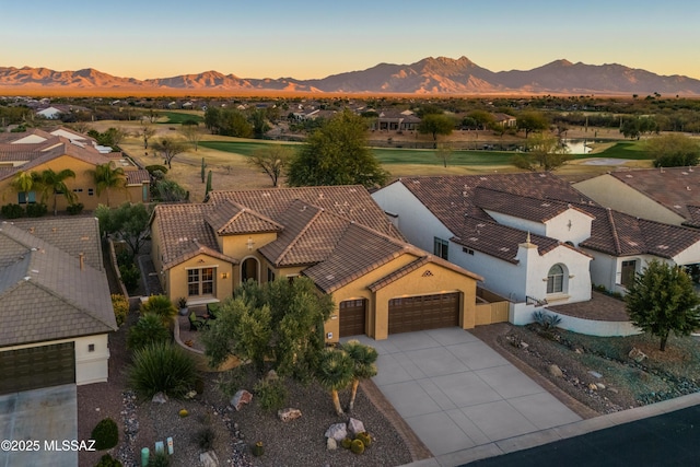 drone / aerial view featuring a mountain view