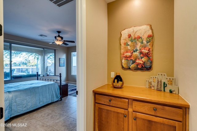 bedroom featuring visible vents and light tile patterned flooring