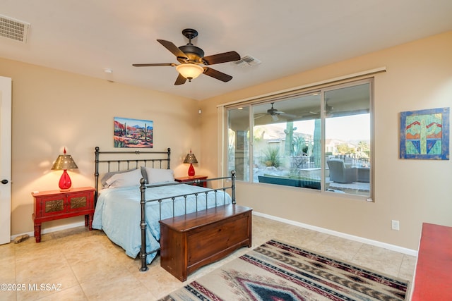 tiled bedroom featuring baseboards and visible vents