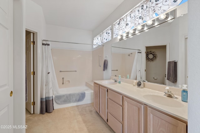 bathroom featuring double vanity, shower / tub combo, carpet floors, and a sink