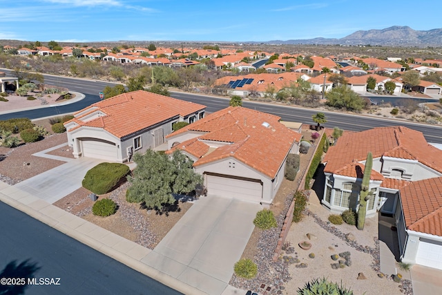 aerial view with a residential view and a mountain view