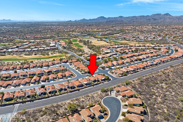 birds eye view of property with a residential view and a mountain view