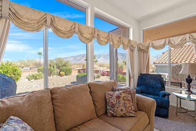 sunroom with a mountain view