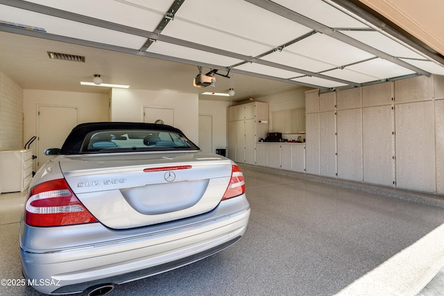 garage with a garage door opener