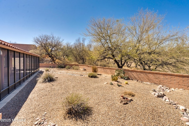 view of yard with fence