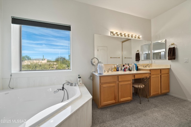 full bath featuring a garden tub, double vanity, and a sink