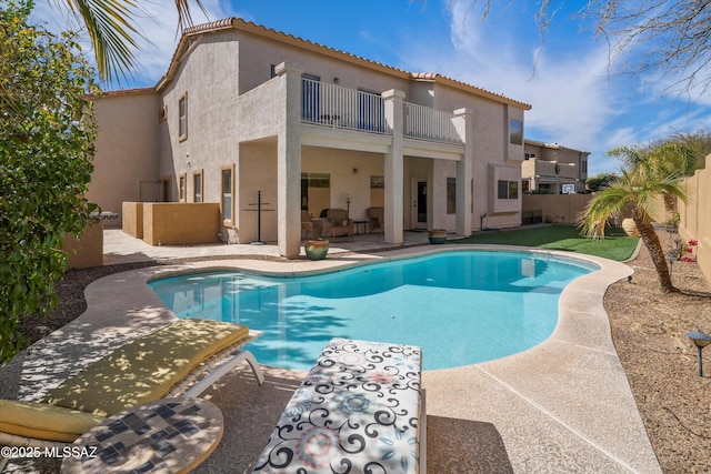 view of pool with a fenced in pool, a patio area, and fence