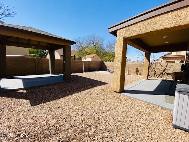 view of yard featuring a fenced backyard and a patio