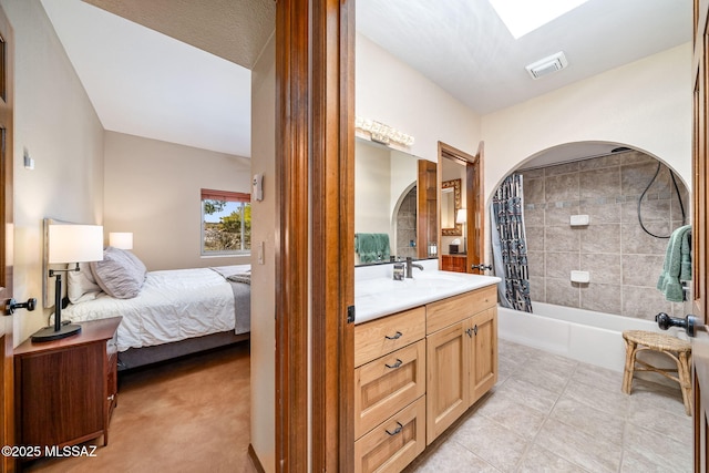 full bathroom with shower / bath combination with curtain, visible vents, connected bathroom, vanity, and tile patterned floors