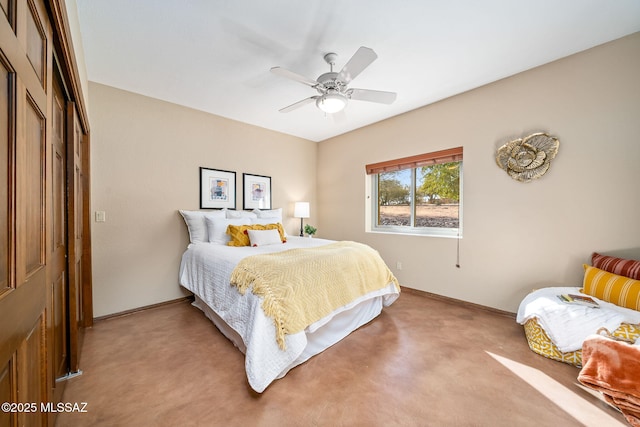 bedroom with a ceiling fan, light colored carpet, and baseboards