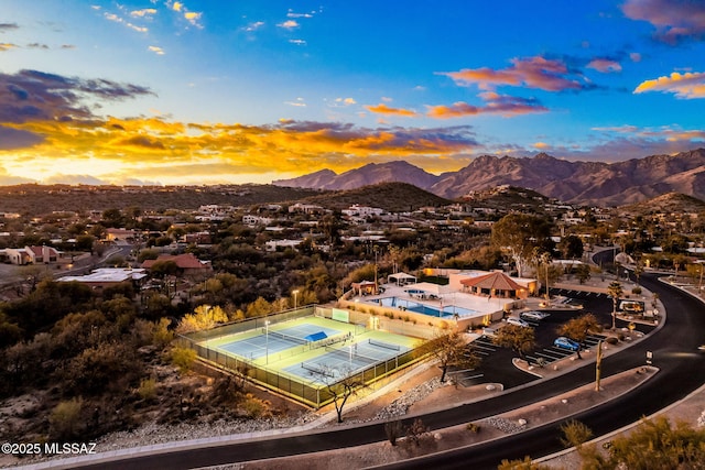 aerial view at dusk with a mountain view