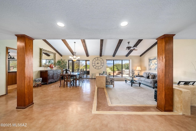 interior space featuring vaulted ceiling with beams, ornate columns, a textured ceiling, and ceiling fan with notable chandelier