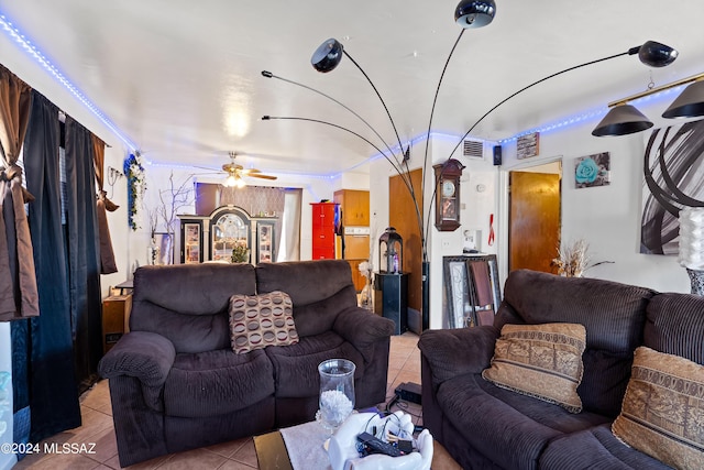 living room featuring light tile patterned floors and ceiling fan