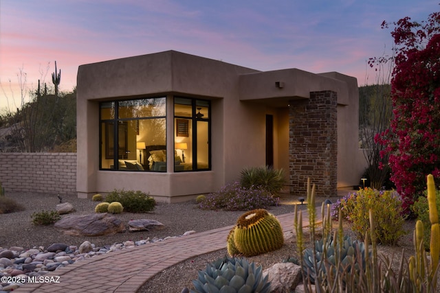 exterior space featuring stucco siding