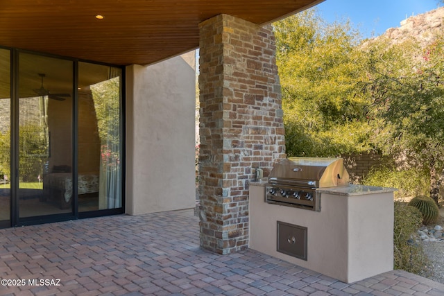 view of patio featuring area for grilling and an outdoor kitchen