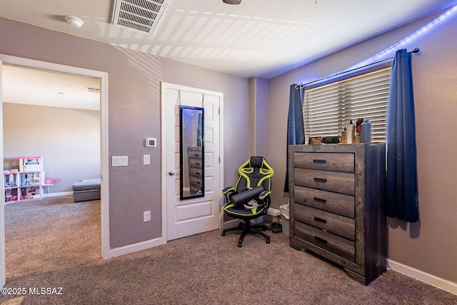 carpeted bedroom featuring baseboards and visible vents