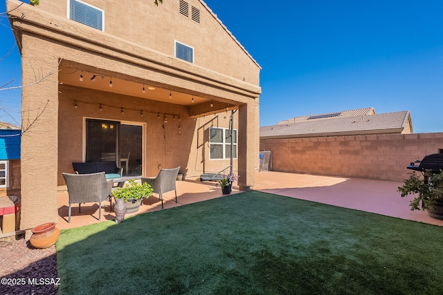 exterior space with a patio area and fence