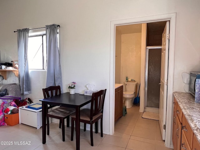 dining room with light tile patterned floors