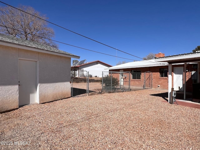 exterior space with fence and a patio