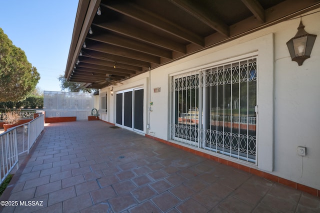 view of patio with ceiling fan