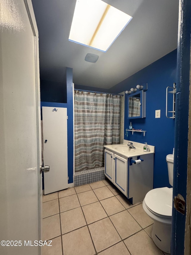 5017 S 11th Ave, Tucson, AZ 85706 - bathroom with tile patterned floors, toilet, vanity, a shower with curtain, and lofted ceiling