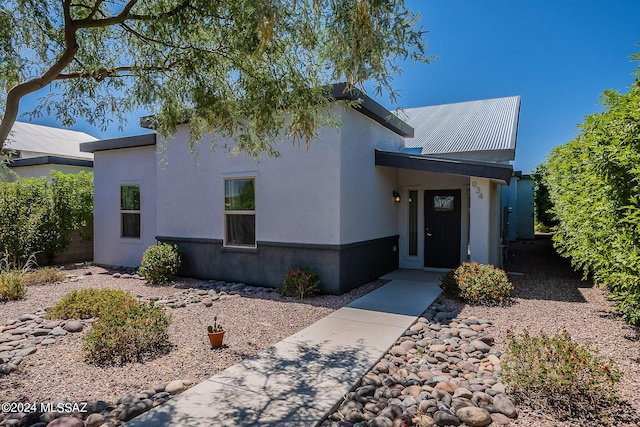 view of front of home featuring stucco siding