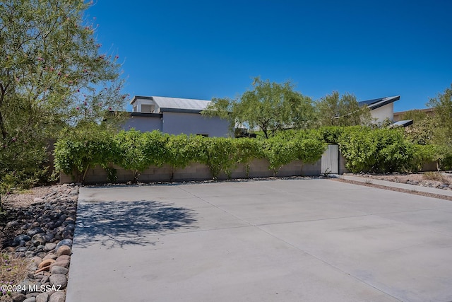 view of patio / terrace featuring fence