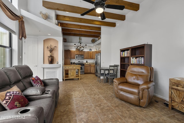 living room featuring baseboards, visible vents, beam ceiling, and a ceiling fan