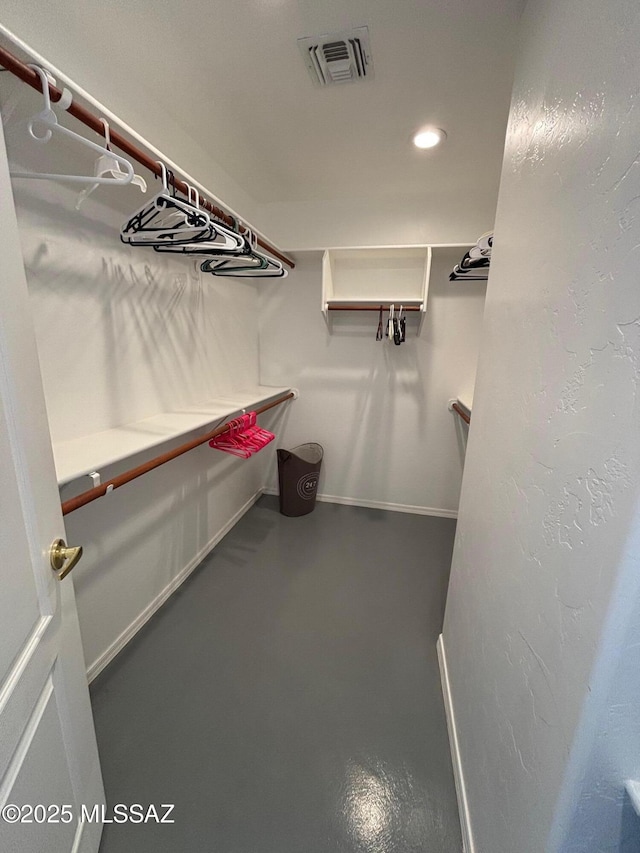 walk in closet with visible vents