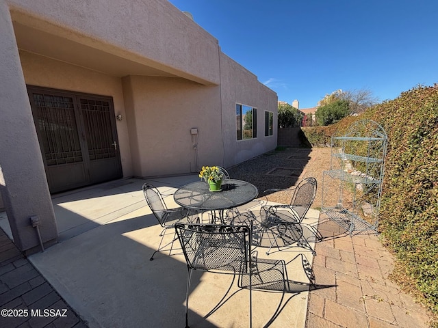 view of patio with fence