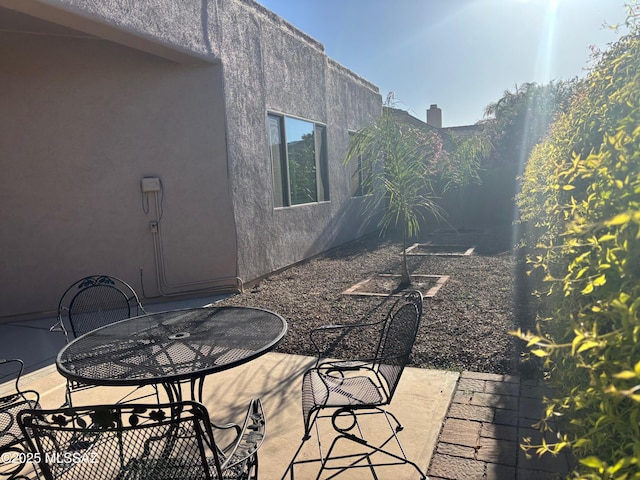 view of patio with outdoor dining space