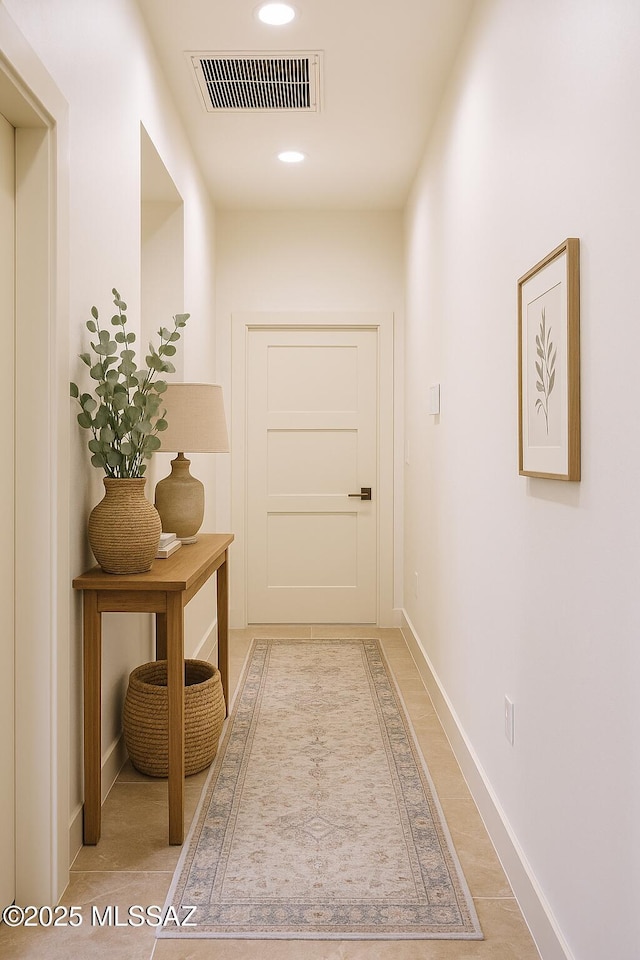 1077 Avenida Aire, Rio Rico, AZ 85648 - hallway featuring baseboards and recessed lighting