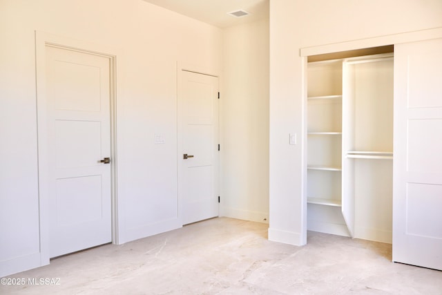 interior space with visible vents and baseboards