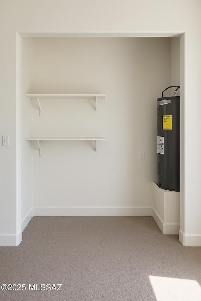 1077 Avenida Aire, Rio Rico, AZ 85648 - utility room featuring electric water heater