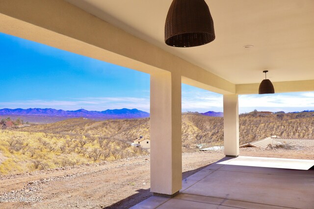 view of patio featuring a mountain view