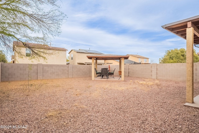 view of yard with a patio and a fenced backyard