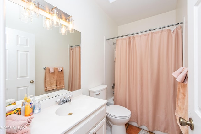 bathroom with toilet, shower / bathtub combination with curtain, and vanity