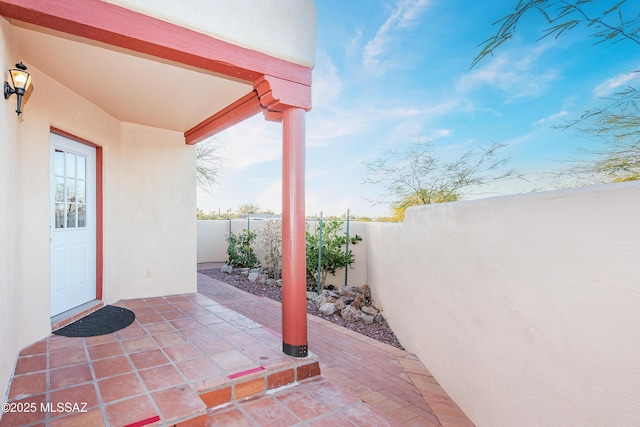 view of patio with fence