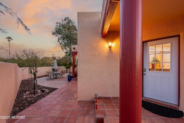 exterior space featuring fence and outdoor dining space