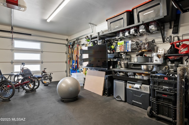 garage featuring a garage door opener