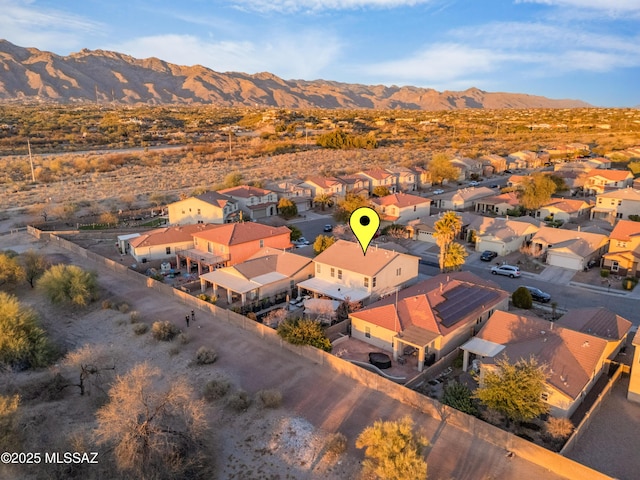 birds eye view of property with a residential view and a mountain view