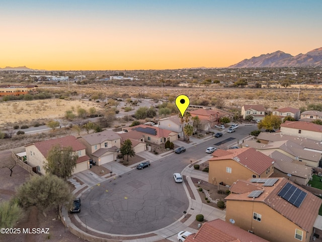 drone / aerial view with a residential view and a mountain view