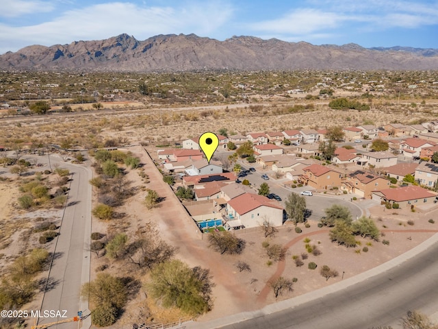 bird's eye view with a residential view and a mountain view